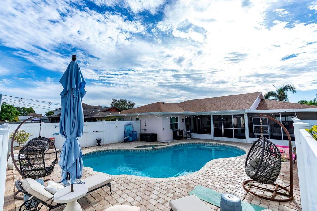 Photo of 601 SE Karrigan Terrace, Port Saint Lucie, FL 34983 (MLS # R11128210)