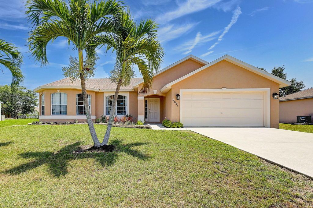 Photo of 2051 SE Ellington Terrace, Port Saint Lucie, FL 34952 (MLS # R10999979)