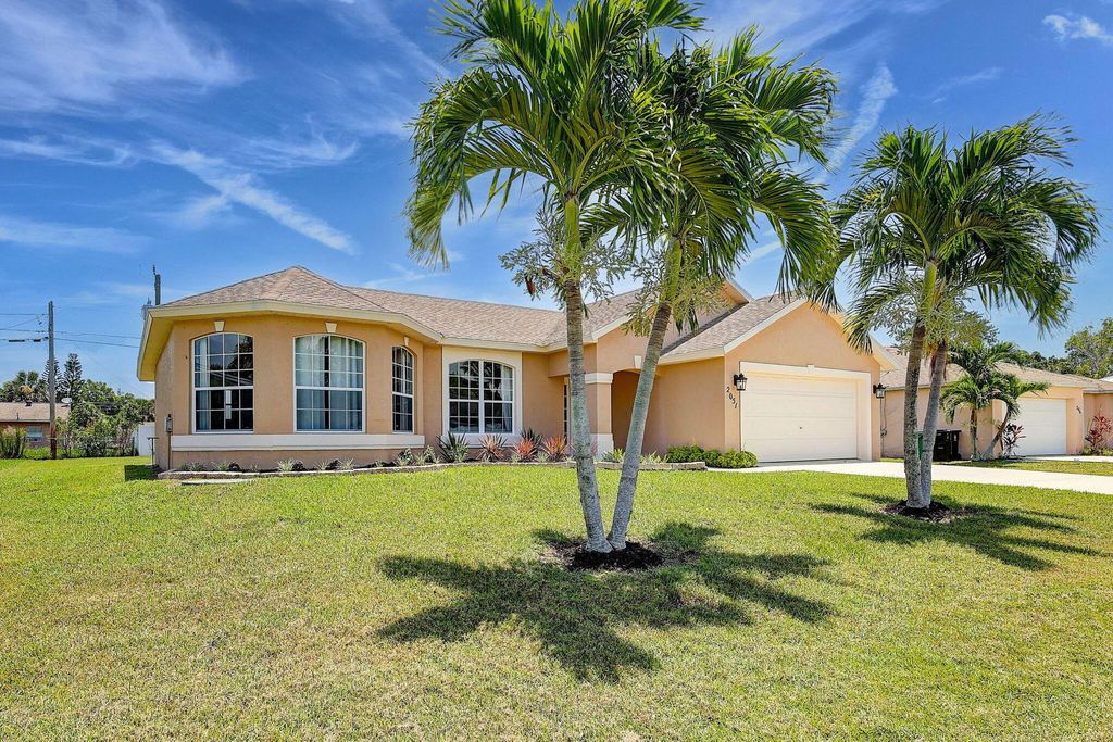 Photo of 2051 SE Ellington Terrace, Port Saint Lucie, FL 34952 (MLS # R10999979)