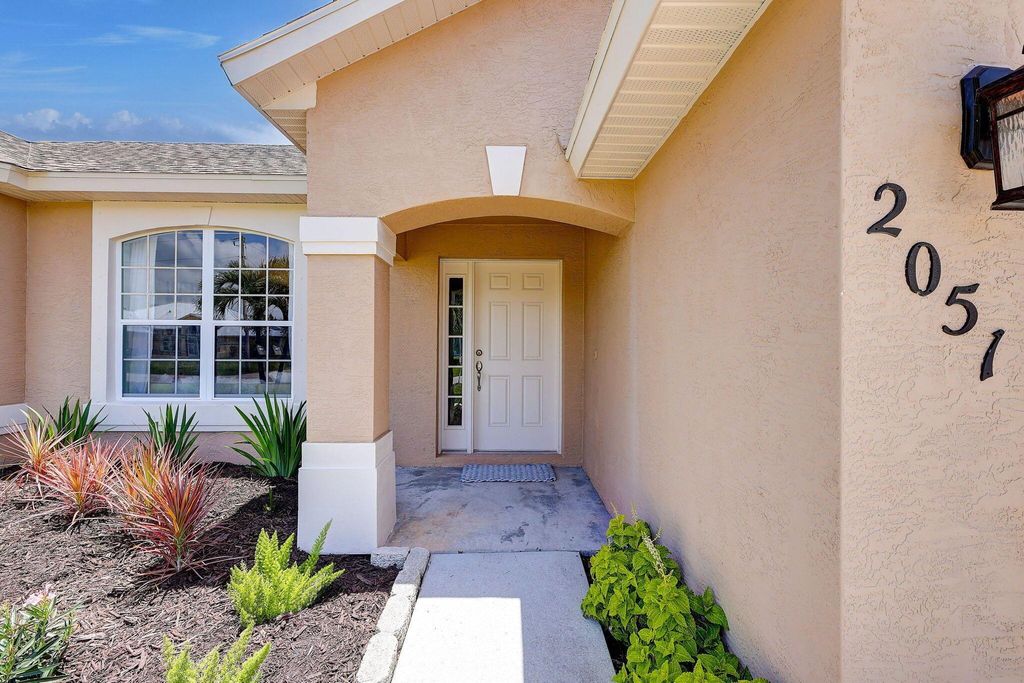 Photo of 2051 SE Ellington Terrace, Port Saint Lucie, FL 34952 (MLS # R10999979)