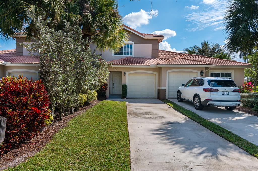 Two story townhouse with magnificent lake views in Green Cay, Boynton. Direct lake views with granite countertops, stainless steel appliances. Large master bedroom, two walk in closets. Tile floor throughout, carpet stairway. All three bedrooms upstairs with full size third bedroom, one car garage with washer and dryer. Light and bright unit with accordion hurricane shutters, new water heater 2021. Wonderful lake front patio to relax and bbq. Resort style community pool with splash fountain and hot tub. Children's playground and exercise room. Walking path around the lake. Can be rented furnished or unfurnished. Turnkey - just bring your toothbrush.