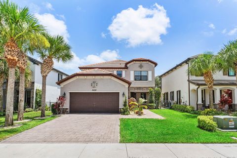 Photo of 5428 Sandbirch Way, Lake Worth, FL 33463 (MLS # B26051423)