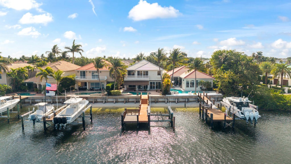 Photo of 712 SANDY POINT Lane, North Palm Beach, FL 33410 (MLS # B26065291)