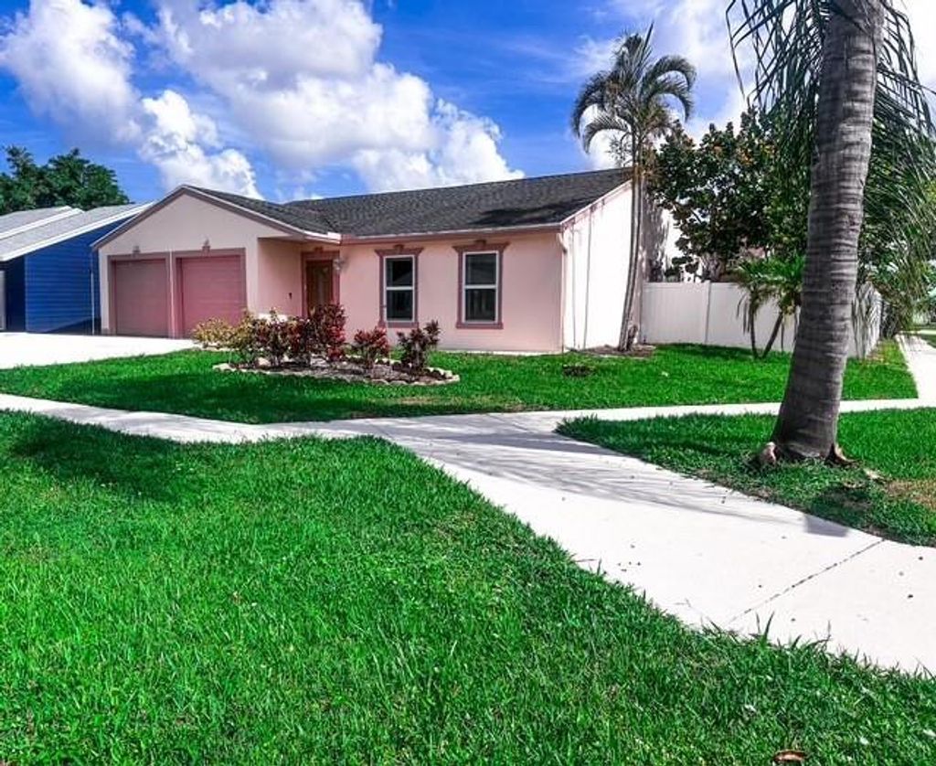 Photo of 5149 S Canal Circle, Lake Worth, FL 33467 (MLS # F10515236)