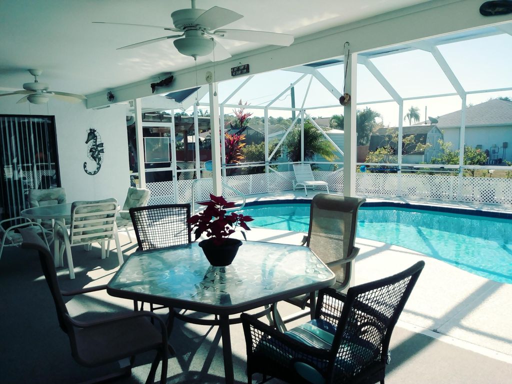 Photo of 980 SE Breakwater Avenue, Port Saint Lucie, FL 34983 (MLS # R10953905)