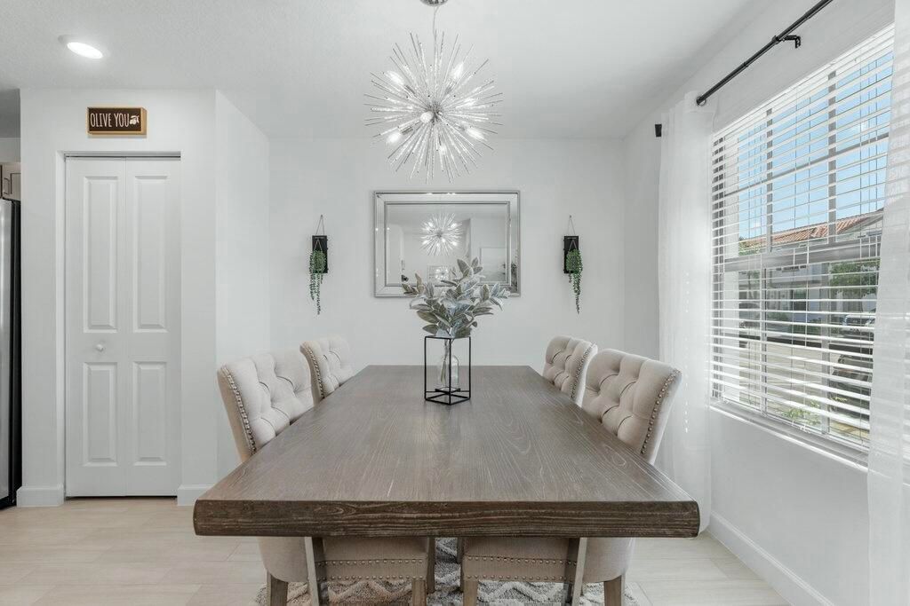 Photo of 5031 Genove Place, Riviera Beach, FL 33410 (MLS # R10995682)