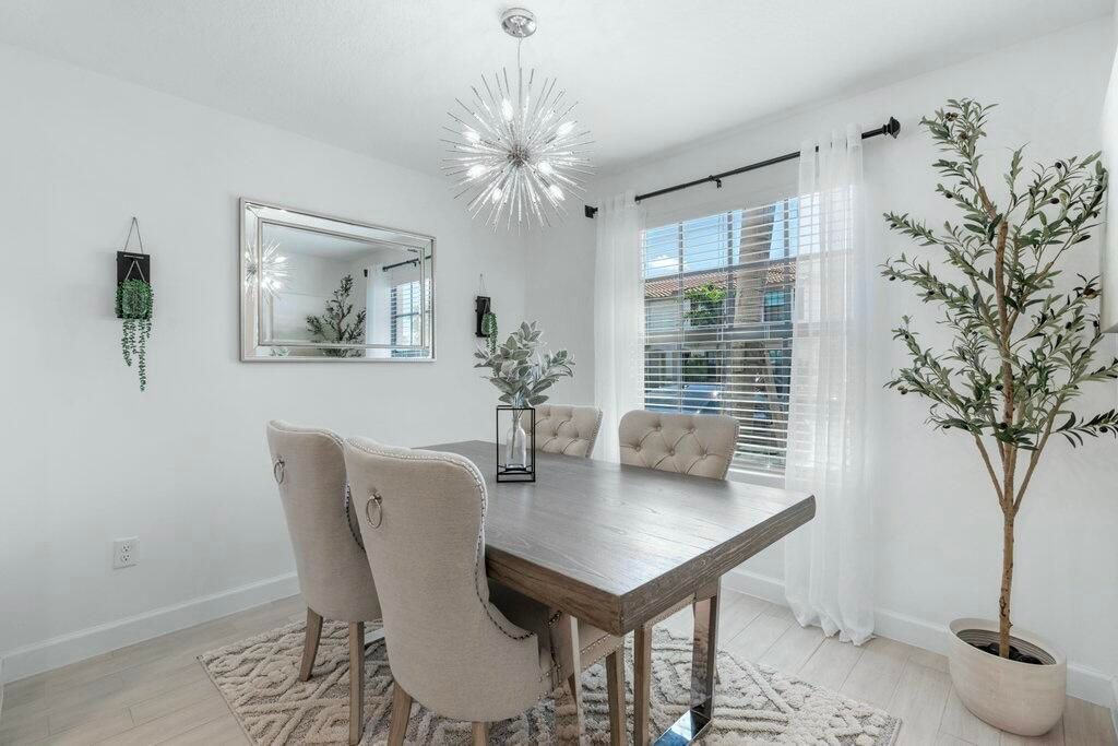 Photo of 5031 Genove Place, Riviera Beach, FL 33410 (MLS # R10995682)