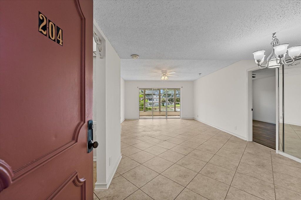Photo of 719 Lori Drive #204, Palm Springs, FL 33461 (MLS # B26002681)