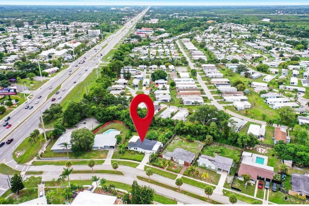 Photo of 120 Banyan Drive, Port Saint Lucie, FL 34952 (MLS # B26039491)