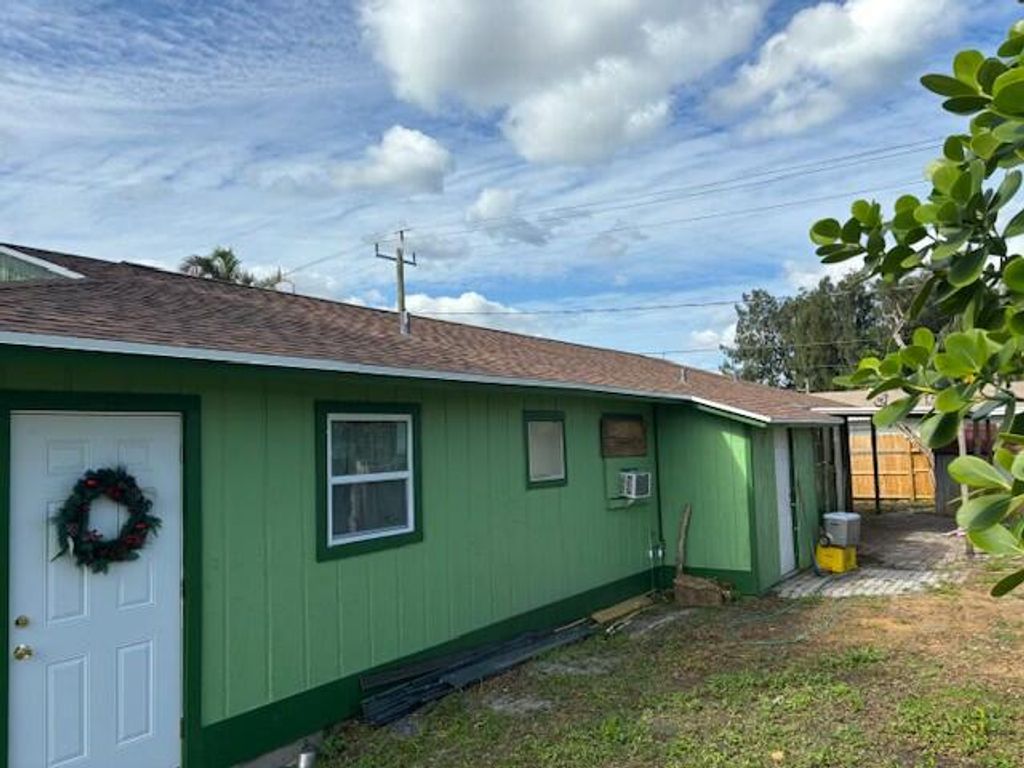 Photo of 3195 Mcsherry Drive, Lake Worth, FL 33461 (MLS # R11054896)