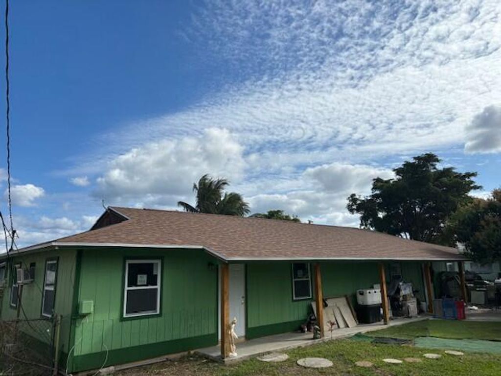Photo of 3195 Mcsherry Drive, Lake Worth, FL 33461 (MLS # R11054896)