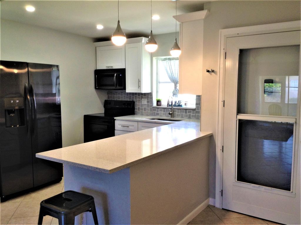 Photo of 2509 Dudley Drive W #D, West Palm Beach, FL 33415 (MLS # R11149823)