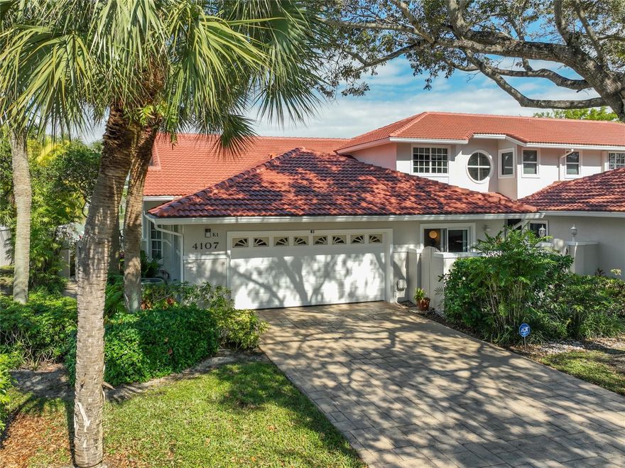 Rarely available single story villa with 2 car garage. Beautifully remodeled kitchen and baths. 20" porcelain flooring. Recently painted outside and roof is new. A/C is 8 yrs old. Wall of impact windows in rear of unit with panoramic view of lake and golf course. Nice open layout with skylights. Dining area was a 3rd bedroom that was opened up.Inside laundry room.