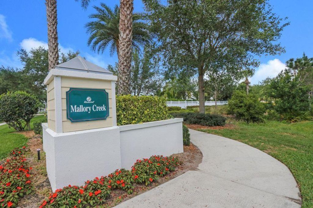 Photo of 3310 W Mallory Boulevard Blvd, Jupiter, FL 33458 (MLS # R10782960)
