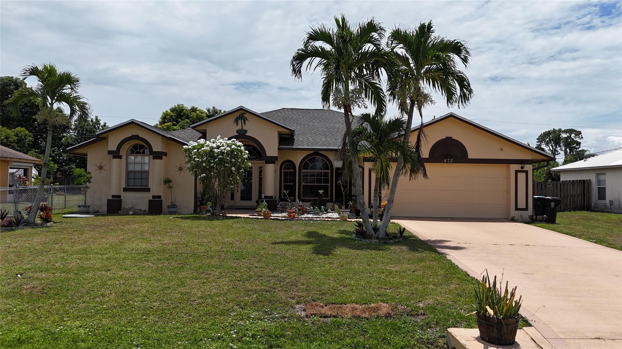 Located in central Port St Lucie, this 3-bedroom, 2-bathroom with 2-car garage home is ready and waiting for its next owner. New roof installed in 2024 and Brand New A/c equipment . Large patio with mango trees that are a sweet delight .However Welcome to your piece of Paradise located at just 20 minutes from the beach .
Owner occupied 24 hour notice is preferred but don't be afraid to ask for sooner. We will do our best to get you in.