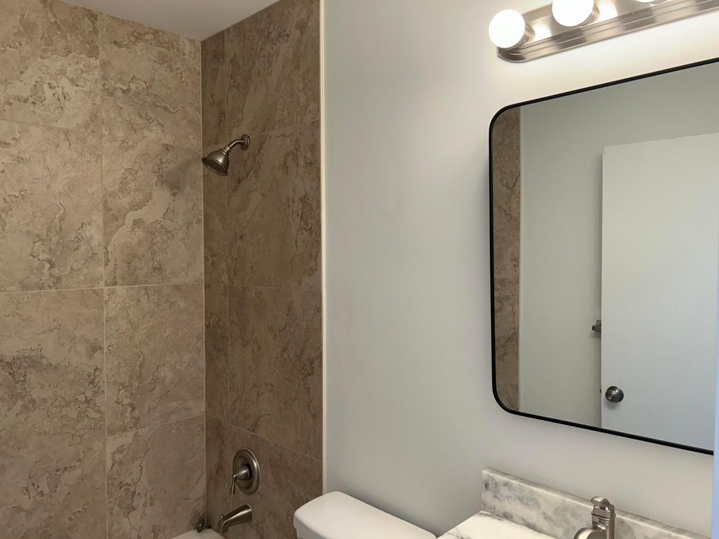 Photo of 661 NW 21st Terrace, Fort Lauderdale, FL 33311 (MLS # B26022937)