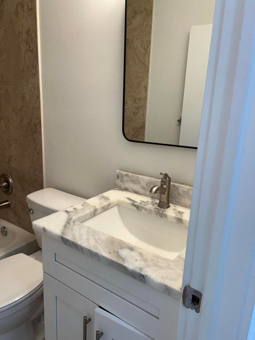 Photo of 661 NW 21st Terrace, Fort Lauderdale, FL 33311 (MLS # B26022937)