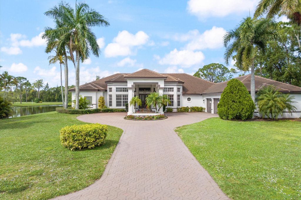 Photo of 8131 Woodsmuir Drive, Palm Beach Gardens, FL 33412 (MLS # R10966611)