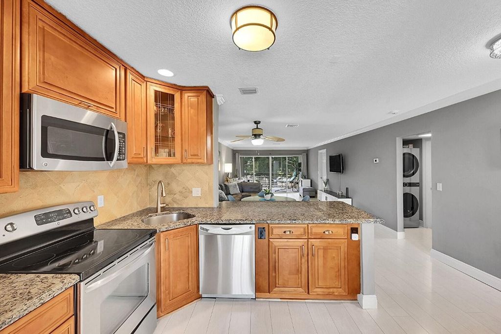 Photo of 11800 Avenue Of The Pga #14, Palm Beach Gardens, FL 33418 (MLS # F10491066)