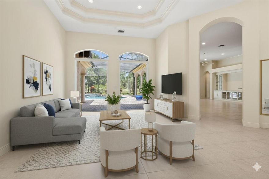 Discover this beautifully upgraded 4-bedroom, 3.5-bathroom home with a versatile den in the prestigious PGA Village community of Port St. Lucie. Designed for comfort and style, this residence offers serene lake and golf course views, creating the perfect backdrop for Florida living.  Step inside to find a chef's kitchen featuring 42-inch cabinets, granite countertops, stainless steel appliances, a center island, breakfast bar, and a convenient butler's pantry. The home includes formal living and dining rooms along with a spacious family room, ideal for entertaining or relaxing with loved ones. The split-bedroom layout ensures privacy, while the den provides a flexible space for a home office or hobbies.