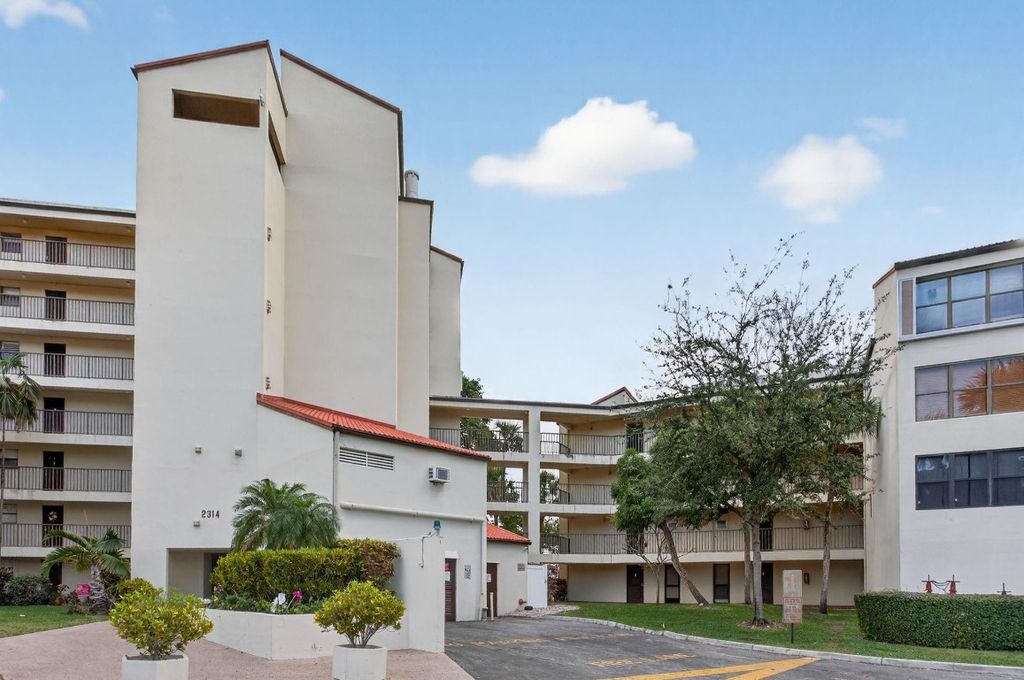 Photo of 2314 S Cypress Bend Drive #114, Pompano Beach, FL 33069 (MLS # F10544158)