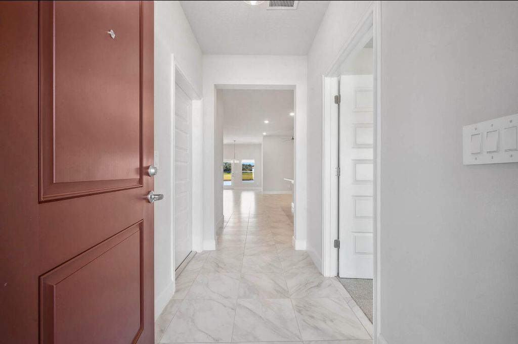 Photo of 8605 Giovanni Avenue, Fort Pierce, FL 34951 (MLS # B26026183)