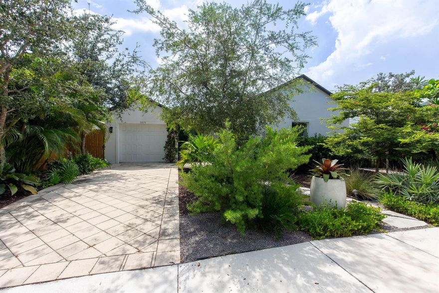 Rare Opportunity in Lake Worth Beach! Don't miss your chance to own this beautifully renovated 3-bedroom, 2.5-bath home, ideally situated just blocks from both downtown and the beach. Featuring a bright, open floor plan and a fully equipped kitchen, this gem is designed for modern living. French doors from both the master suite and kitchen lead to a spacious, fenced backyard--perfectly landscaped with a charming outdoor dining area for entertaining or relaxing.This home truly has it all--style, comfort, and location. A must-see!