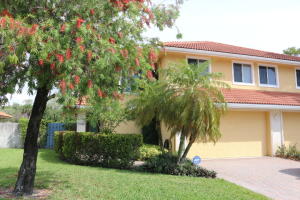 Beautiful 3 bedroom, 2 1/2 bathroom townhouse with a den and 2 car garage! Excellent location and ready for immediate move-in. Tile flooring downstairs and wood flooring upstairs. Spacious townhouse with over 2,000 living square feet and a large patio area with fenced back yard.