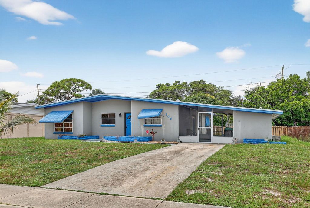 Photo of 106 NE Entrada Avenue, Port Saint Lucie, FL 34952 (MLS # R11119039)