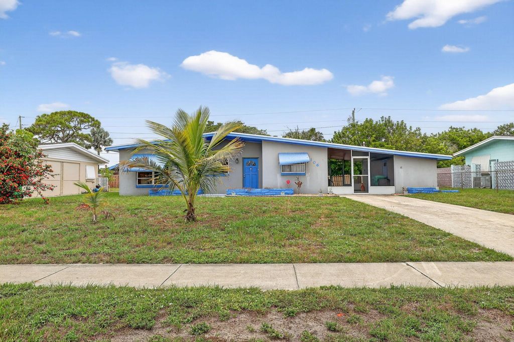 Photo of 106 NE Entrada Avenue, Port Saint Lucie, FL 34952 (MLS # R11119039)