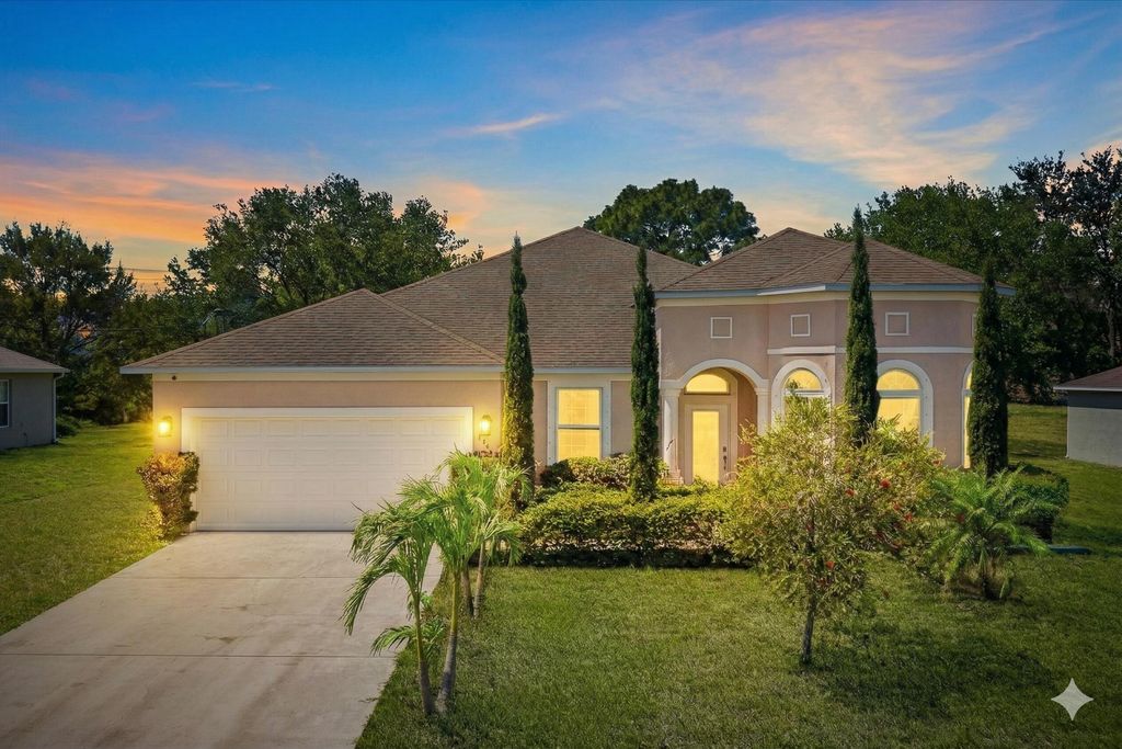 Photo of 5744 NW Cahaba Street, Port Saint Lucie, FL 34986 (MLS # B26005663)