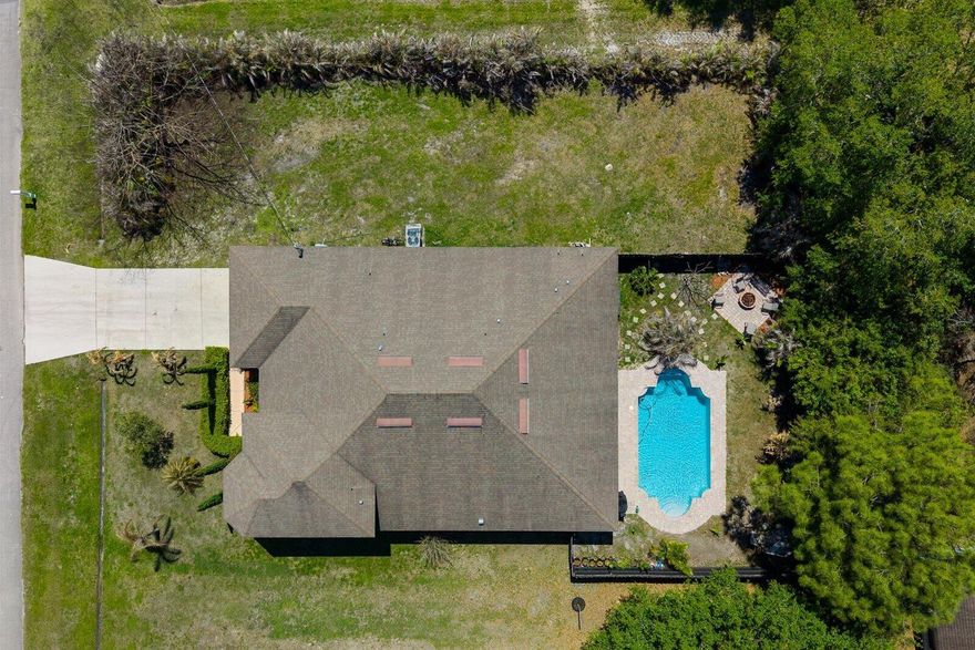 Beautiful newer 2016-built pool home located in the highly desirable Torino area of Port St. Lucie. This spacious 4-bedroom with a flex room, 3-bath home offers over 2,700 sq ft of living space on an oversized .30-acre lot. Featuring a thoughtfully designed split floor plan, open-concept living areas, and abundant natural light throughout. The kitchen flows seamlessly into the main living space, making it ideal for both everyday living and entertaining. Step outside to your private backyard oasis complete with a saltwater pool and plenty of space to relax or host guests. Additional highlights include a 2-car garage, generously sized bedrooms, and no HOA. Conveniently located near shopping, dining, and major highways, this home offers the perfect combination of comfort, space, and location.