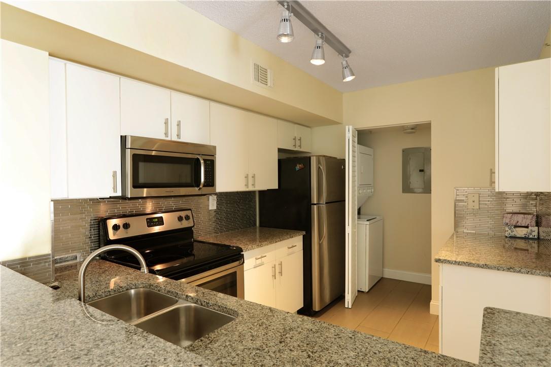 Lovely remodeled 3 bedroom 2 bath spacious second floor condo in the community of Royal Grand. Open kitchen with stainless appliances and granite counters, vaulted ceiling, tiled throughout, newer washer and dryer. Large balcony with lake view. Assigned parking with 3 spaces plus additional guest parking. Fantastic ;location near Nova University, shopping, dining, public transportation, airport and highways. Pets will be considered with pet deposit, maximum wight limit is 50 lbs. Annual lease only, available as of September 1, 2025.