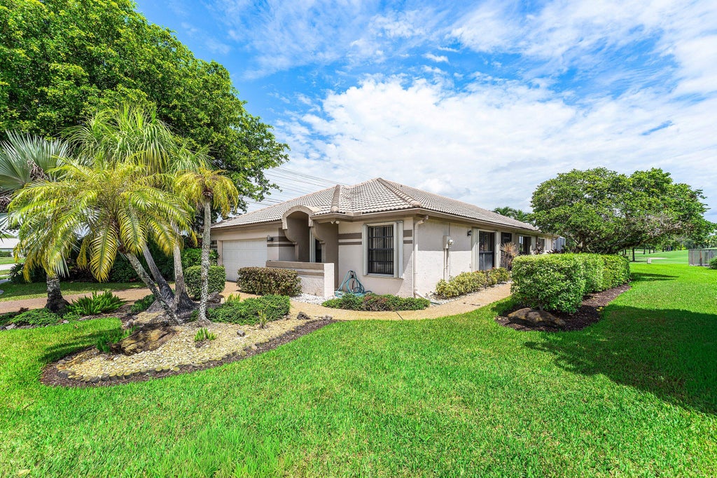 Photo of 10991 HIGHLAND Circle, Boca Raton, FL 33428 (MLS # B26061257)