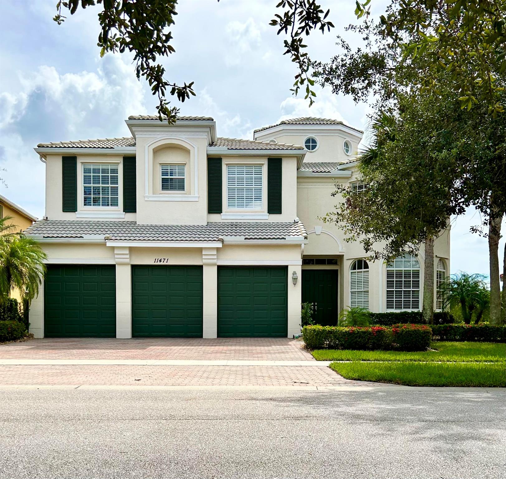 This spectacular 5 bedroom, 5 1/2 bath, 3 car garage Charleston model home in the desirable gated community of Town Park at Tradition is a sight to see. This beautifully maintained home welcomes you through the grand foyer into a bright and spacious floorplan featuring high ceilings, crown molding, custom chair rail and ceramic tile on the diagonal throughout the main living areas. This spectacular 4,200sf+/- two story home has an elegantly designed chef's kitchen that showcases granite countertops, a large island, high-end stainless-steel appliances, porcelain tile backsplash and a huge pantry. Proceed up the grand staircase to the luxurious master suite with wood floors, a large walk-in closet, sitting area, and private screened balcony with preserve views. The master bathroom features