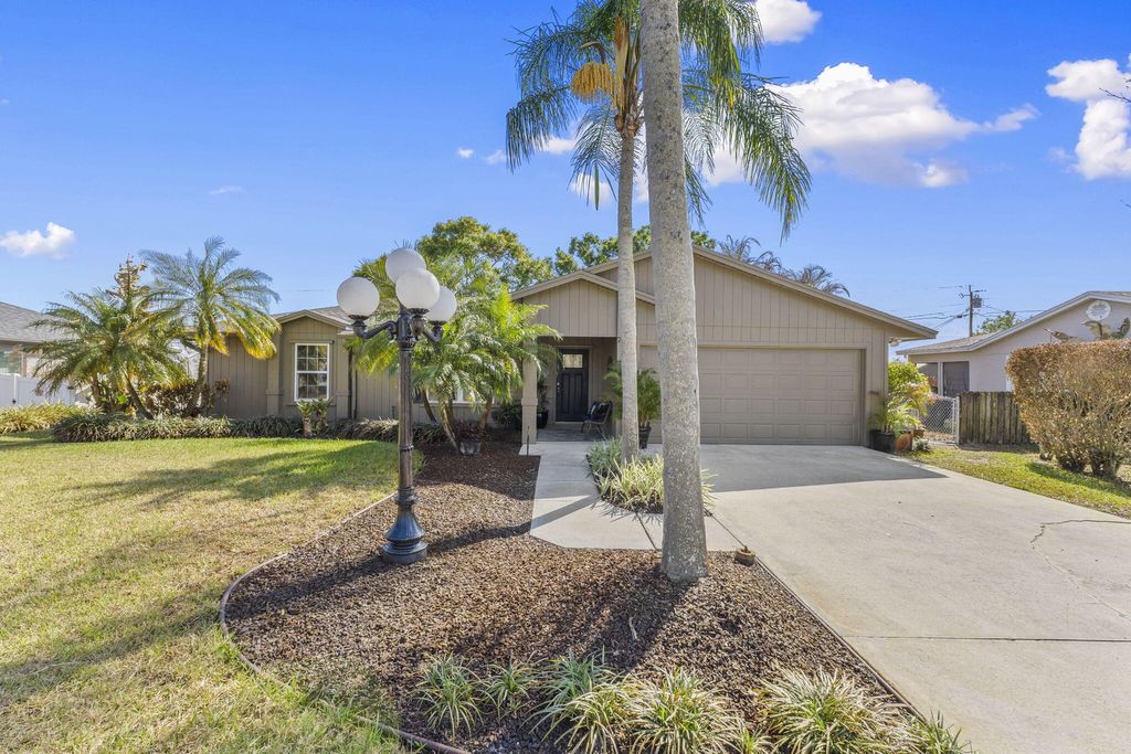 Photo of 726 NW Placid Avenue, Port Saint Lucie, FL 34983 (MLS # R11165174)