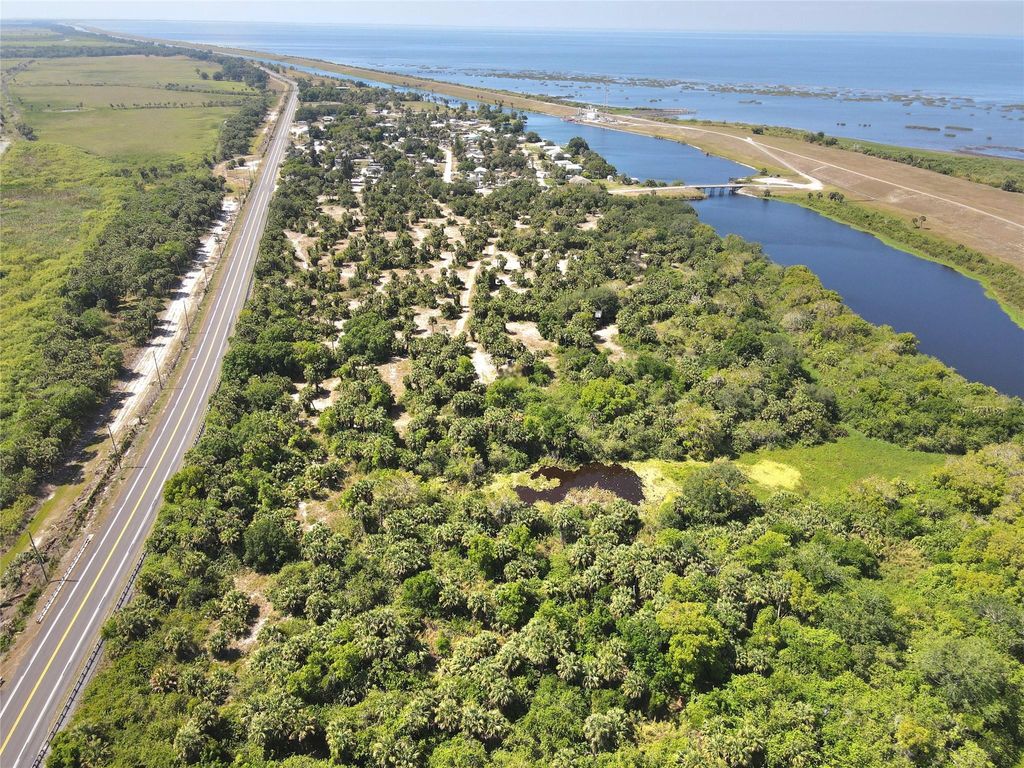 Photo of TBD Tbd Tbd, Okeechobee, FL 34974 (MLS # F10501929)
