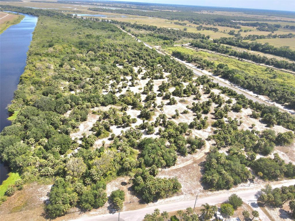 Photo of TBD Tbd Tbd, Okeechobee, FL 34974 (MLS # F10501929)