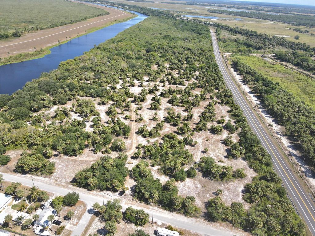 Photo of TBD Tbd Tbd, Okeechobee, FL 34974 (MLS # F10501929)