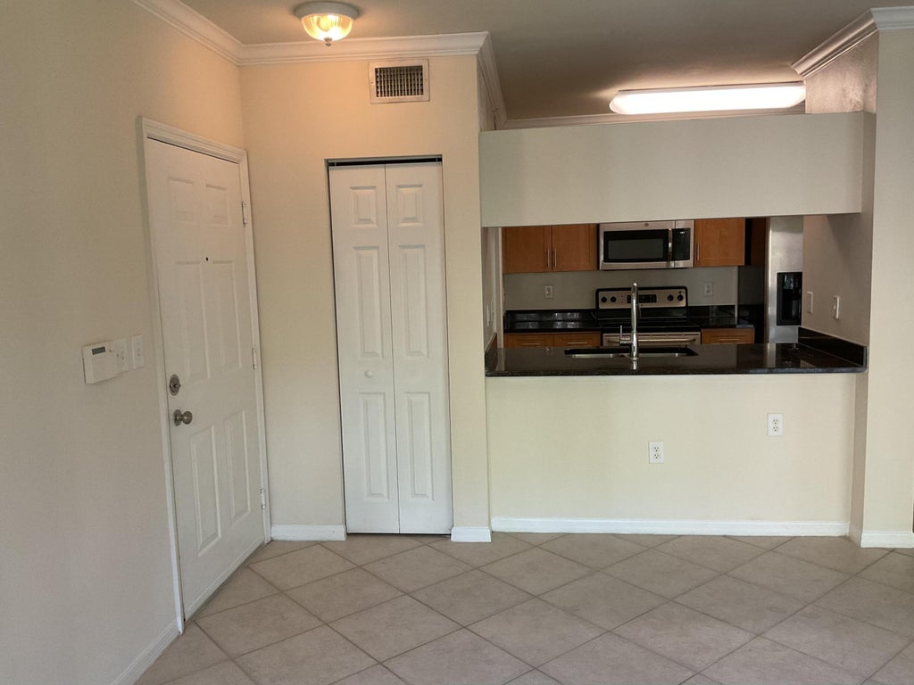 Photo of 6556 Emerald Dunes Drive #206, West Palm Beach, FL 33411 (MLS # R10948135)