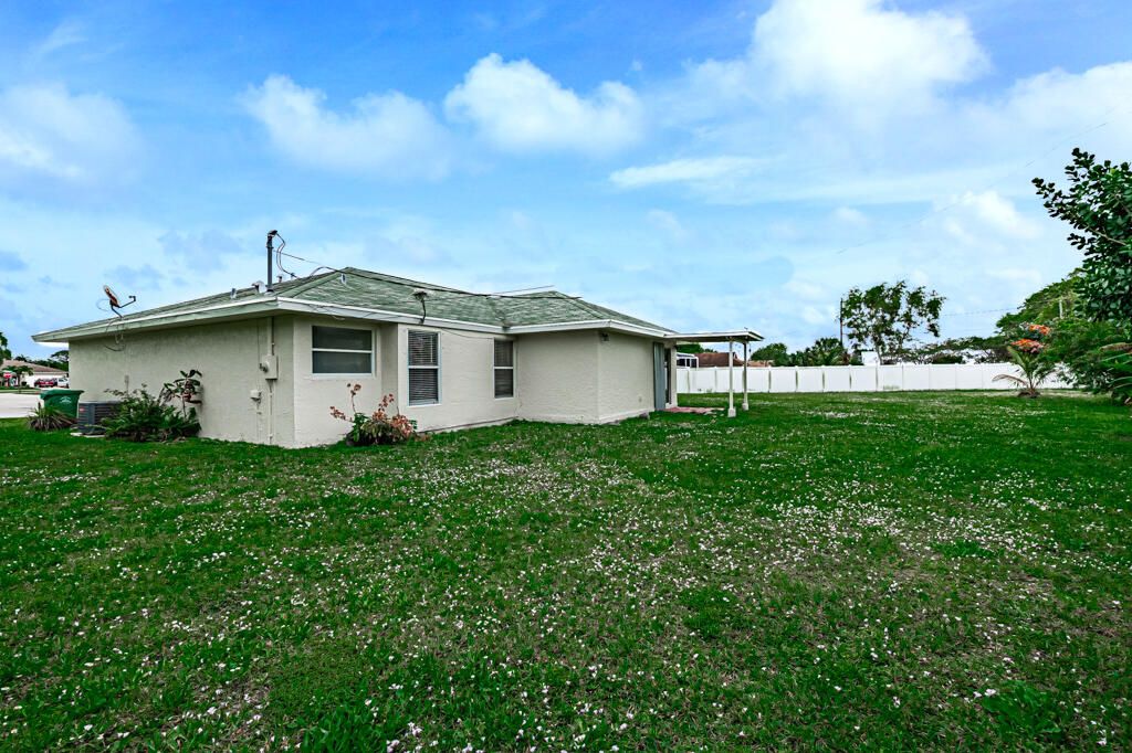 Photo of 2800 SE Tate Court, Port Saint Lucie, FL 34952 (MLS # R10966839)