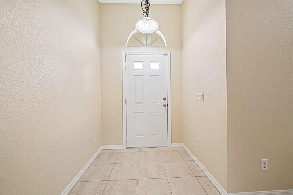 Photo of 2800 SE Tate Court, Port Saint Lucie, FL 34952 (MLS # R10966839)