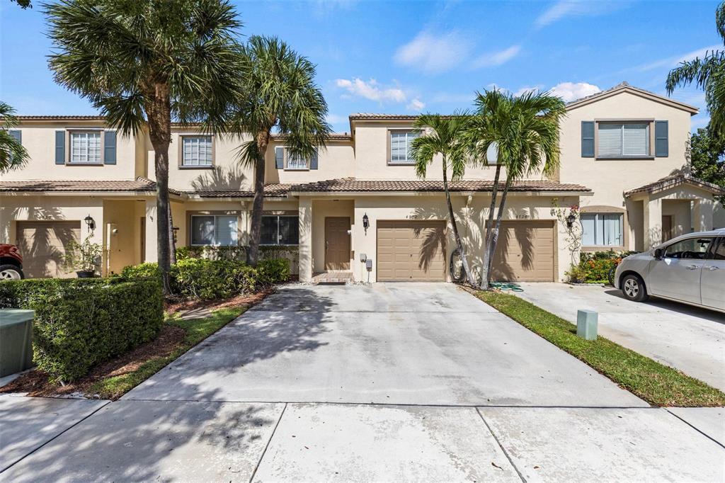 Photo of 4722 Lago Vista Drive, Coconut Creek, FL 33073 (MLS # B26036063)