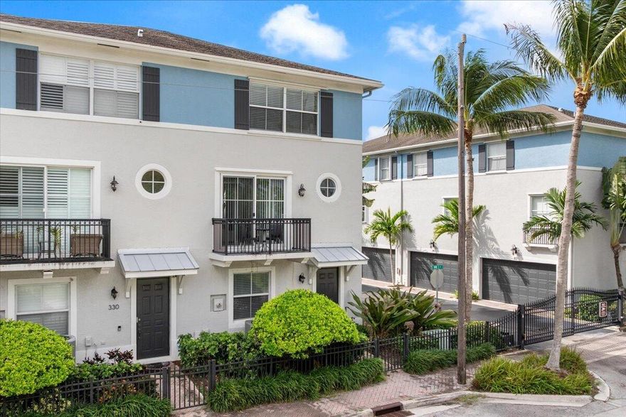 Discover the charm of downtown Delray Beach living in this rarely available corner unit townhouse within the gated community of Atlantic Grove. Minutes from vibrant Atlantic Avenue, this updated 3BR, 3.1-BA, 2CG residence offers approximately 1,820 sf of the ideal blend of comfort, convenience, and coastal style across three beautifully designed levels. The main floor showcases an open-concept layout ideal for everyday living and entertaining, featuring a modern kitchen with granite countertops, stainless steel appliances, and a breakfast bar that flows seamlessly into the dining and family room areas. A N facing balcony invites natural light and creates the ideal setting for morning coffee or evening relaxation.