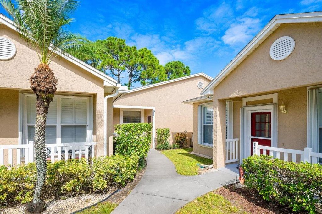 Photo of 521 NW San Remo Circle, Port Saint Lucie, FL 34986 (MLS # R10931707)