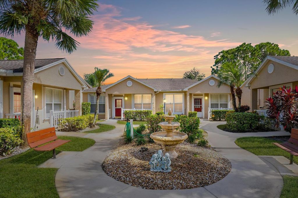 Photo of 521 NW San Remo Circle, Port Saint Lucie, FL 34986 (MLS # R10931707)