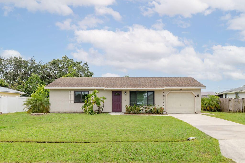 Photo of 2512 SE Calusa Avenue, Port Saint Lucie, FL 34952 (MLS # R10996594)
