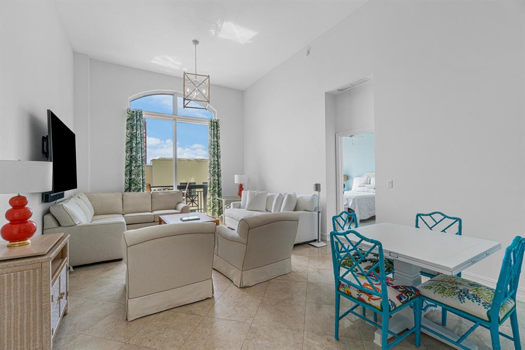 This east water view 2 bedroom, 2 bathroom, plus den luxury condo boasts ultra-high ceilings and has the most breathtaking sunrise intracoastal waterway views from every room! Dramatic floor-to-ceiling expansive windows, marble flooring, spacious over-sized bedrooms and Primary walk-in closet, plus Peloton in condo are a few of the special qualities within this luxury residence. Amenities in this full-service building include; 24hr security, concierge, roof top pool/hot tub, sauna/steam rooms, outdoor kitchen & BBQ area, outdoor & indoor movie theaters, club room, courtyard, fitness center, dedicated dog area, complimentary valet parking & exceptional staff.