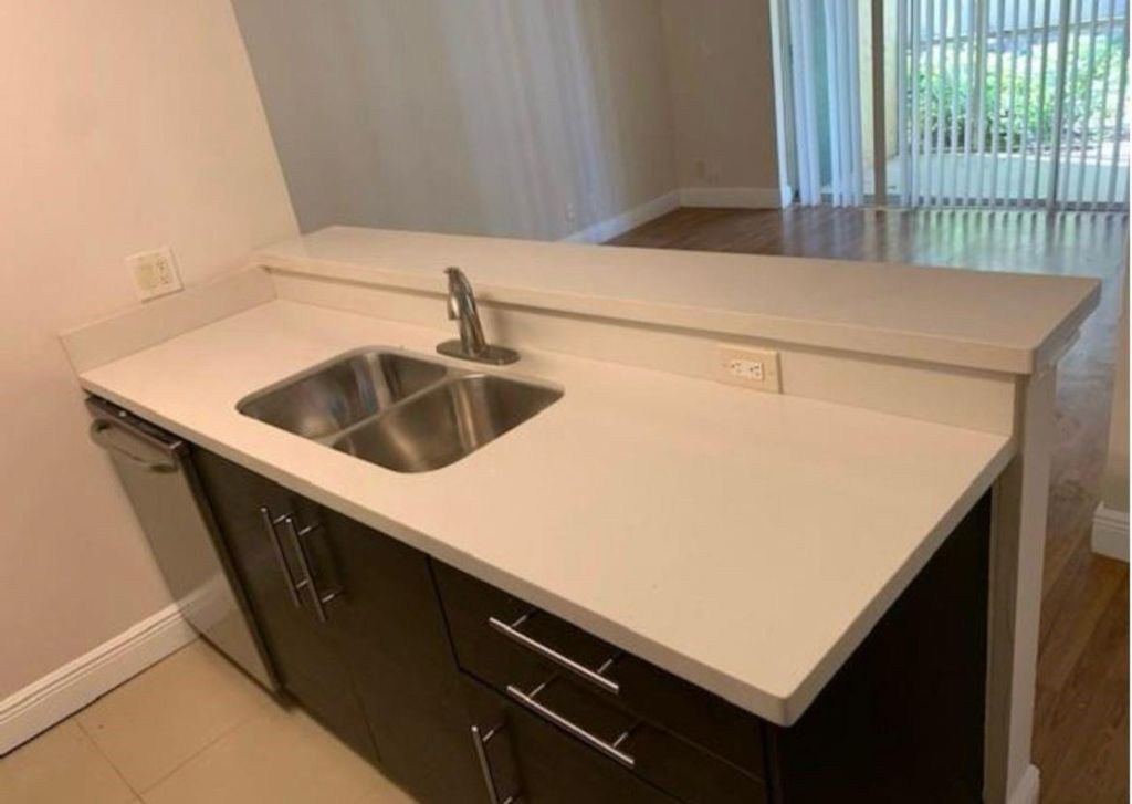 Photo of 5760 Rock Island Road #310, Tamarac, FL 33319 (MLS # F10546667)