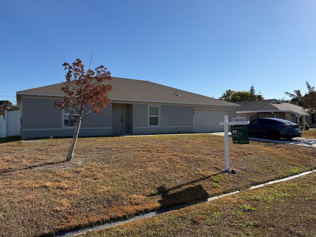 Photo of 2143 SE Trillo Street, Port Saint Lucie, FL 34952 (MLS # R11163023)